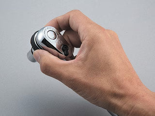 Hand holding a Nepros 3/8"Sq. Quick Spinner (Compact)