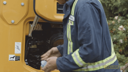 Heavy dity mechanic turning on a 35G john Deere mini excavator