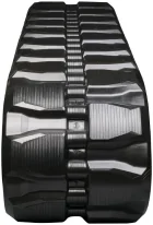 Rubber track with block tread pattern.