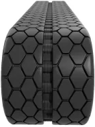 Rubber track with hex tread pattern.