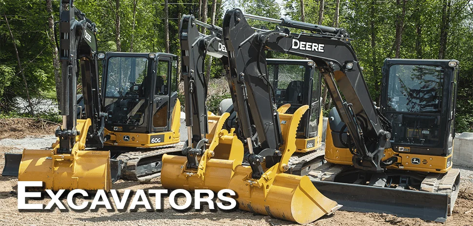 collection of parked JD mini excavators