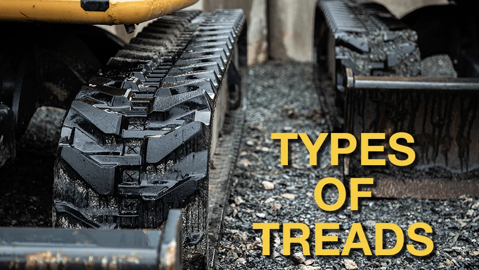 close up of the tread pattern on rubber tracks on heavy equipment
