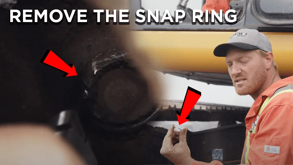 Close-up of where to find the snap ring on an excavator