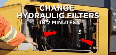 Image with text overlay saying,"Change Hydraulic Filters in 2 Minutes" with pro-mechanic holding dozer in the background
