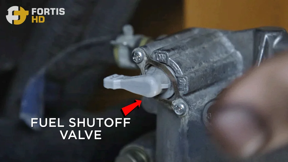 Arrow points at the fuel shutoff valve.