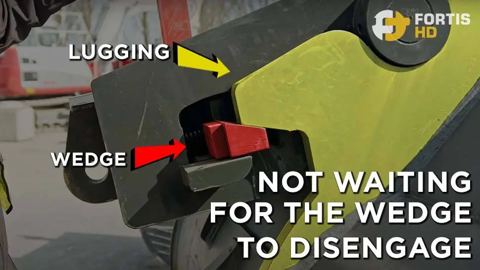 A common problem when changing excavator attachments is not waiting for the wedge to disengage.