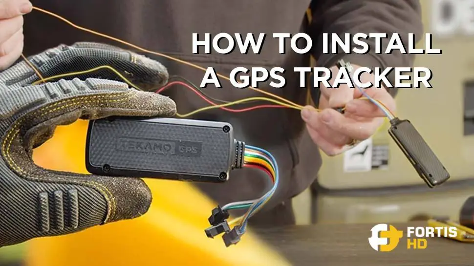 Heavy-duty mechanic holds a GPS. The overlay text reads: How to install a GPS tracker.