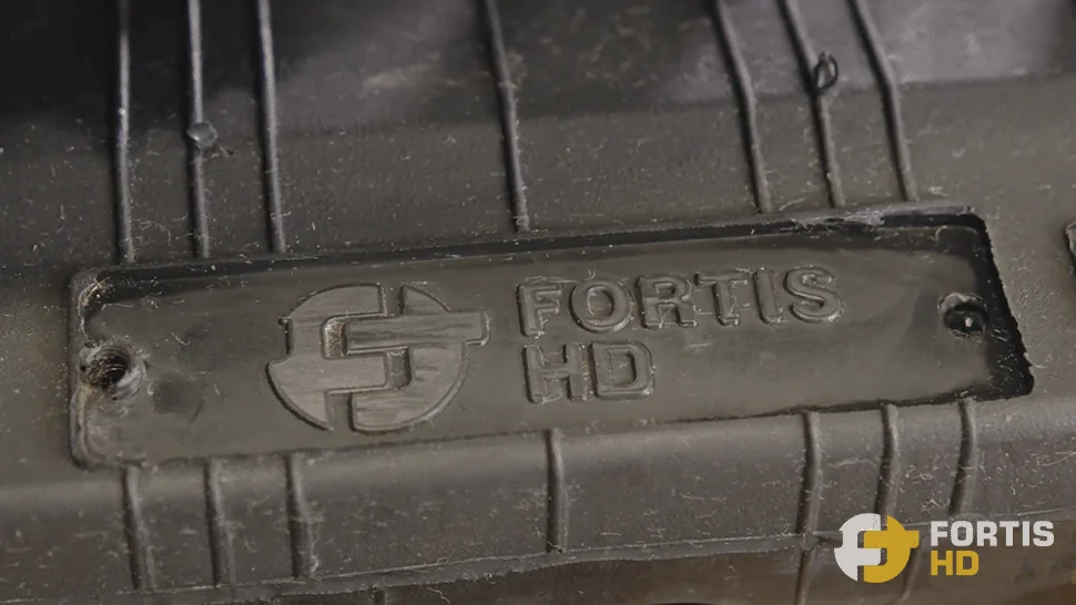Close-up of the Forits HD mark on one of its premium rubber tracks.